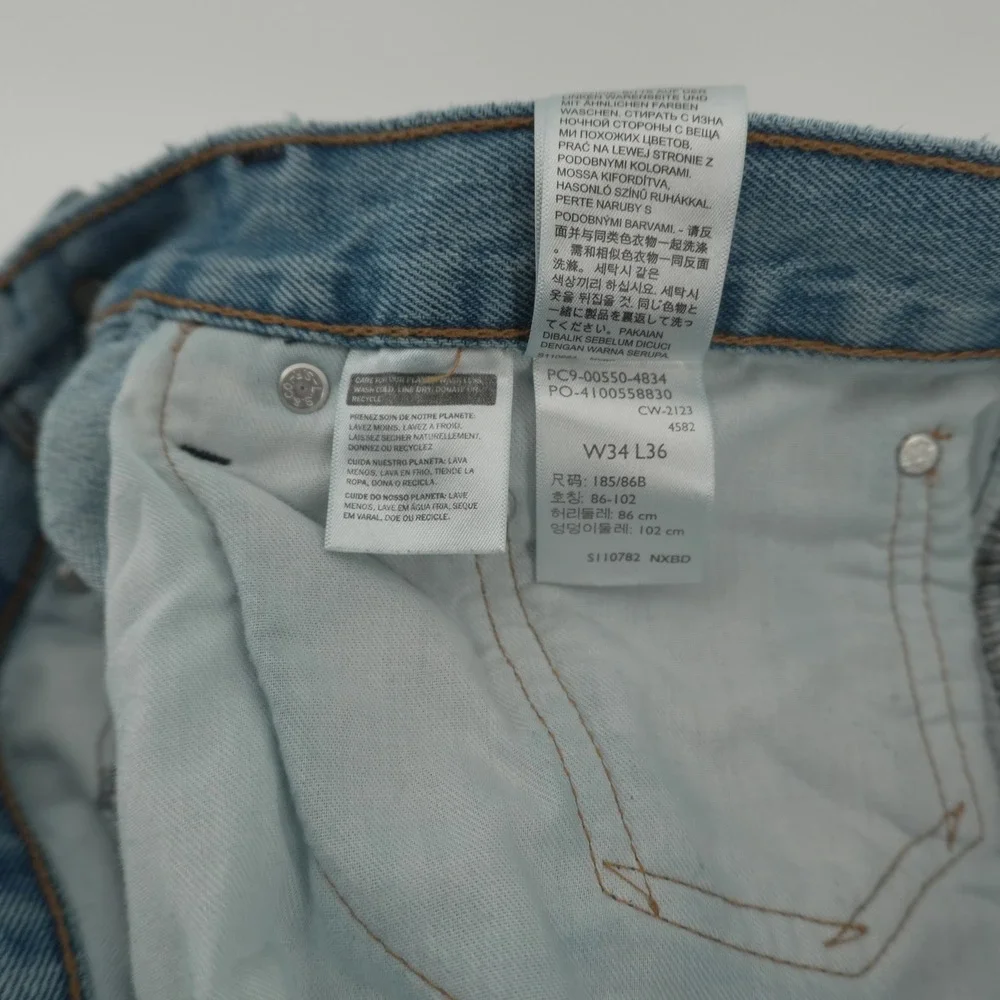 Levi's 550 Relaxed Fit Jeans Mens W34 L36 Light Wash Blue Tapered Leg Denim